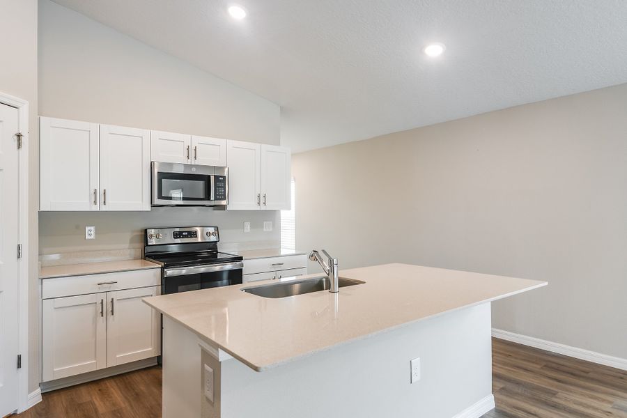Furnished interior view inside a new home in Scenic Terrace, Haines City (Image 6).