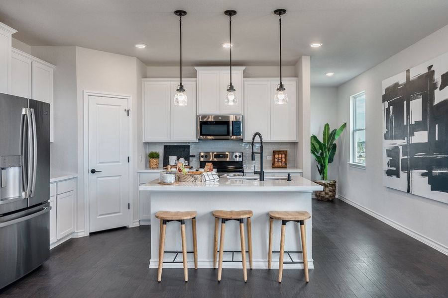 Representative furnished interior of a home built from the Rhapsody 2 by Taylor Morrison in Longview 40s, Del Valle (Image 41).