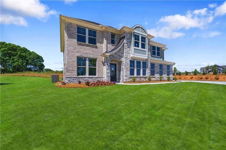 Exterior details and patio area of a home in Brighton, Locust Grove (Image 3).