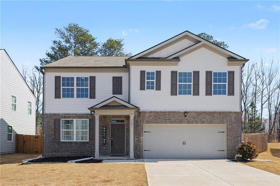 Front exterior of a new home in , Dallas, GA, highlighting curb appeal (Image 2). Front exterior of a new home in , Dallas, GA, highlighting curb appeal (Image 2).