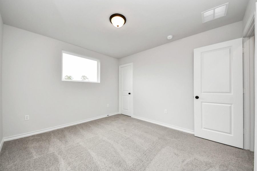 Spacious, unfurnished interior of a new home in The Enclave at Spring Branch, Montgomery (Image 38).