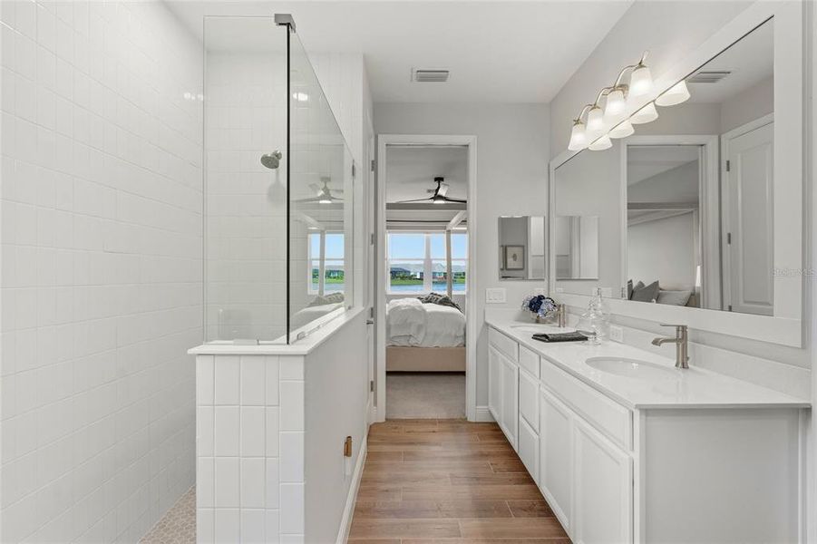 Furnished interior view inside a new home in LakeHouse Cove at Waterside, Sarasota (Image 9). Furnished interior view inside a new home in LakeHouse Cove at Waterside, Sarasota (Image 9).