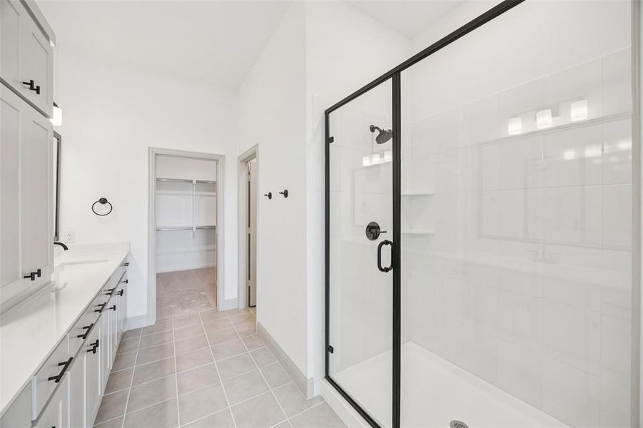 Featuring an oversized walk in shower, you'll never want to leave this beautiful owner's bath! Featuring an oversized walk in shower, you'll never want to leave this beautiful owner's bath!