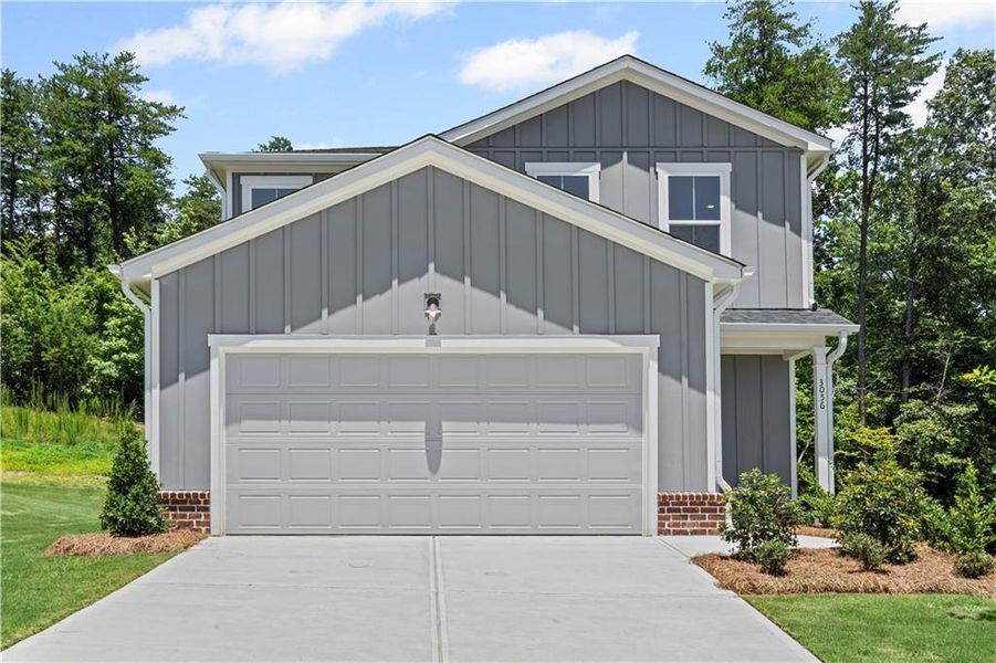 Front exterior of a new home in Avery Ridge, Gainesville, GA, highlighting curb appeal (Image 1).
