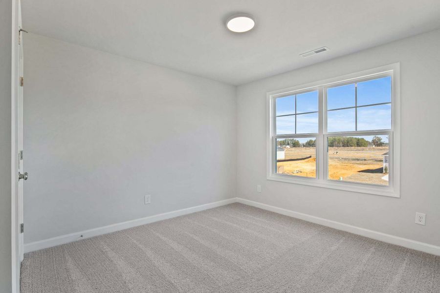 Representative unfurnished interior of a home built from the Camellia by Caviness & Cates Communities in Bartlett Manor, Youngsville (Image 108).