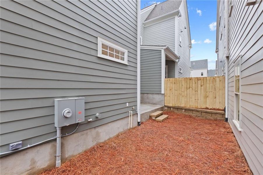 Front exterior of a new home in , Woodstock, GA, highlighting curb appeal (Image 18).