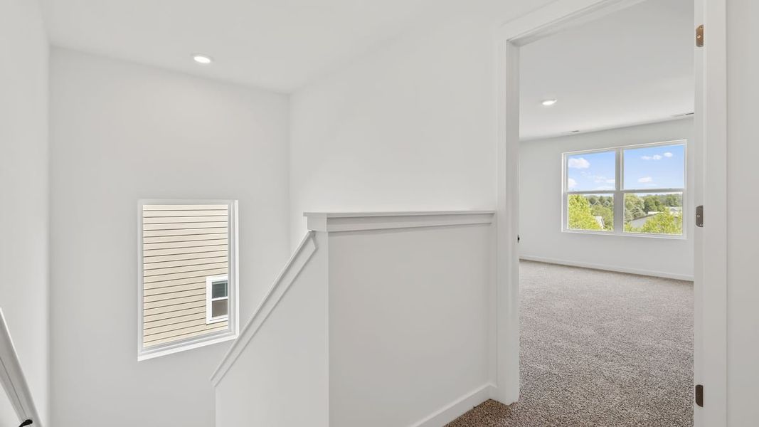 Representative unfurnished interior of a home built from the Holcombe by D.R. Horton in Peachtree Meadows, Rockwall (Image 24).