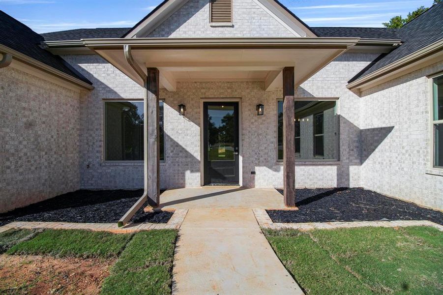 Exterior details and patio area of a home in , Lindale (Image 25).