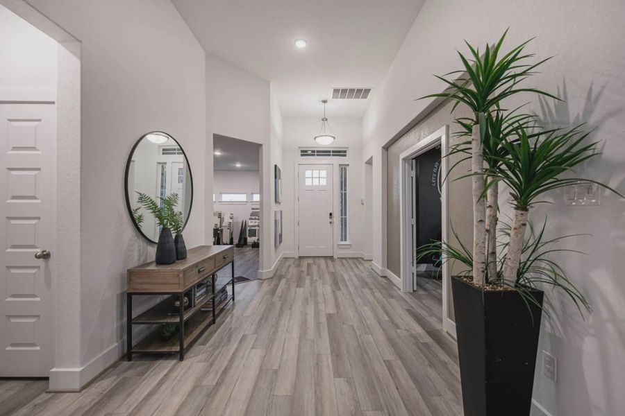 Representative furnished interior of a home built from the Barron by Chesmar Homes in Lariat, Liberty Hill (Image 5).