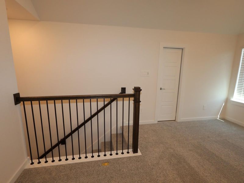 Spacious, unfurnished interior of a new home in Pinewood at Grand Texas, New Caney (Image 12).