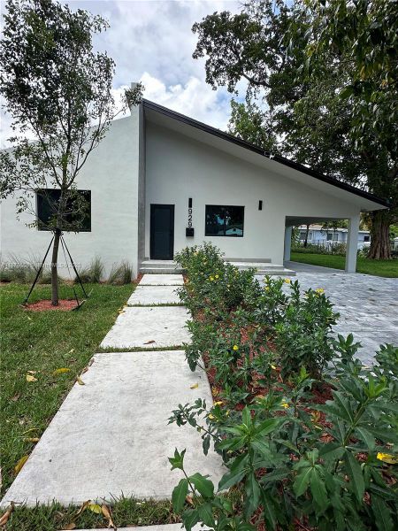 Front exterior of a new home in , Miami, FL, highlighting curb appeal (Image 33).