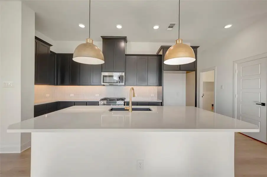 Furnished interior view inside a new home in Creekshaw – Classic, Royse City (Image 10).