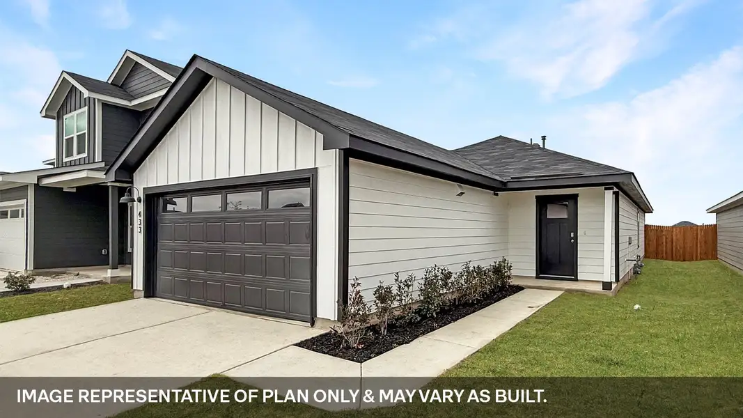 Front exterior of a new home in Prairie Lakes, Buda, TX, highlighting curb appeal (Image 2).