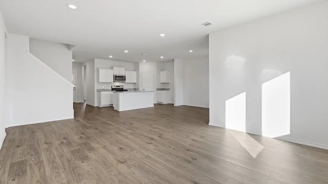 Representative unfurnished interior of a home built from the Mercury by D.R. Horton in Windrose, Pilot Point (Image 7).