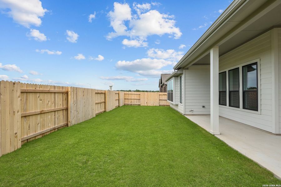 Exterior details and patio area of a home in Buffalo Crossing, Cibolo (Image 26).