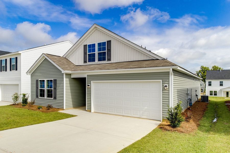 Front exterior of a new home in Winston Point, Gilbert, SC, highlighting curb appeal (Image 1). Front exterior of a new home in Winston Point, Gilbert, SC, highlighting curb appeal (Image 1).