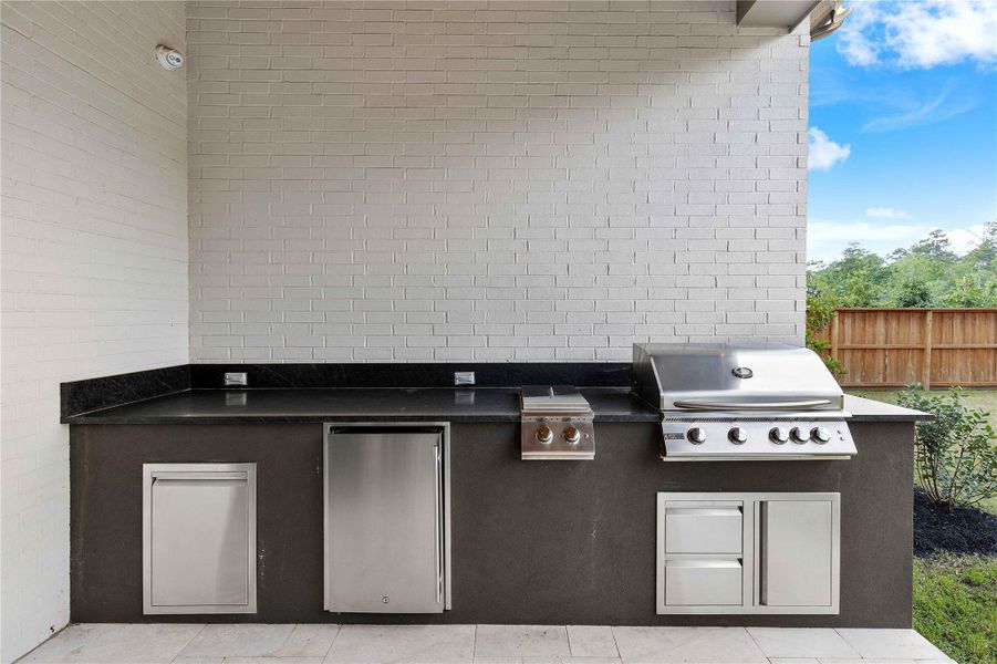 Exterior details and patio area of a home in , Spring (Image 25).