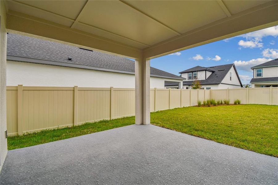 Exterior details and patio area of a home in Oakfield at Mount Dora Cottage Series, Mount Dora (Image 3).