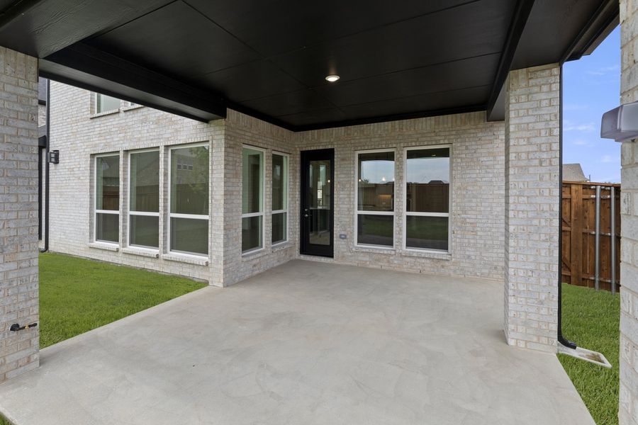 Exterior details and patio area of a home in Nelson Lake Estates, Rockwall (Image 3).