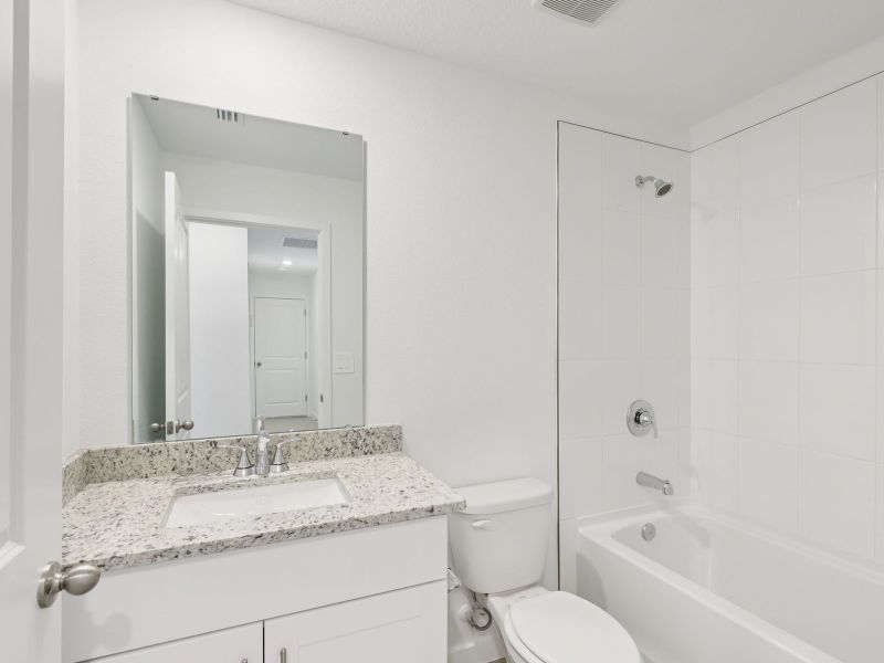 Furnished interior view inside a new home in Flagler Village - Classic Series, Palm Coast (Image 7). Furnished interior view inside a new home in Flagler Village - Classic Series, Palm Coast (Image 7).