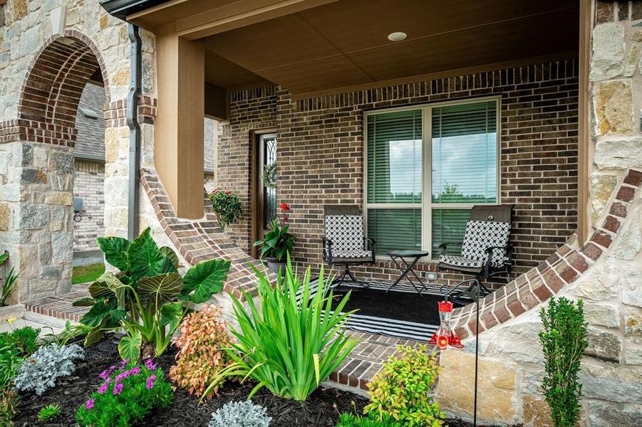 Exterior details and patio area of a home in West Crossing, Anna (Image 26). Exterior details and patio area of a home in West Crossing, Anna (Image 26).