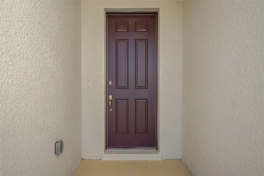 Exterior details and patio area of a home in Willowbrook North, Winter Haven (Image 19).