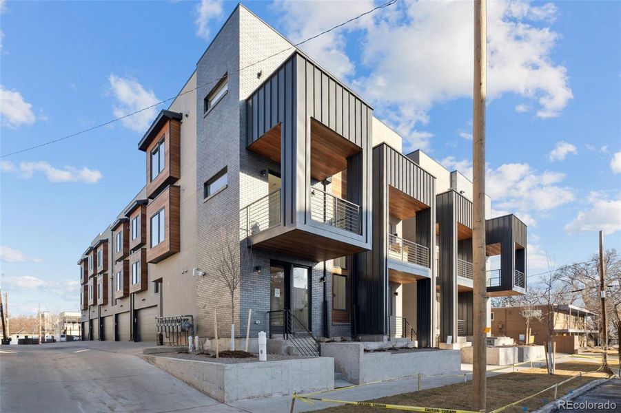 Front exterior of a new home in , Denver, CO, highlighting curb appeal (Image 17).