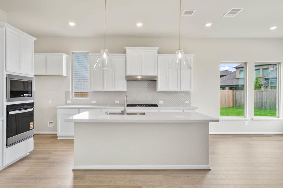 Furnished interior view inside a new home in Bridgeland, Cypress (Image 7).