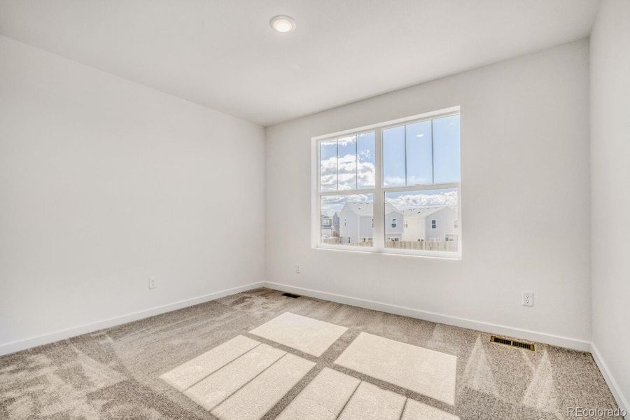Spacious, unfurnished interior of a new home in Copper Chase, Colorado Springs (Image 11).