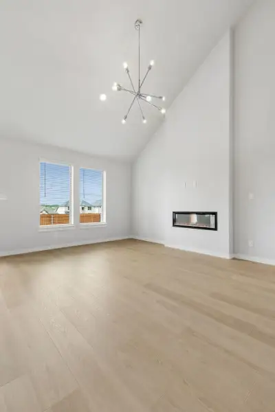 Living Room in the Winters home plan by Trophy Signature Homes – REPRESENTATIVE PHOTO