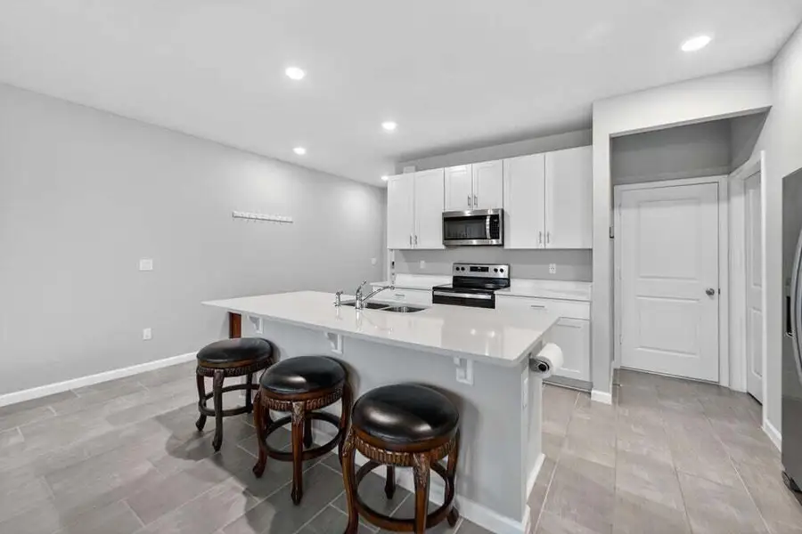 Furnished interior view inside a new home in Enclave at Mangonia Park, West Palm Beach (Image 6).