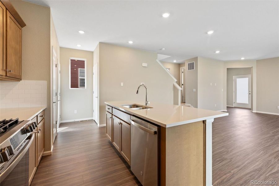 Furnished interior view inside a new home in Woodrose at Painted Prairie, Aurora (Image 10).