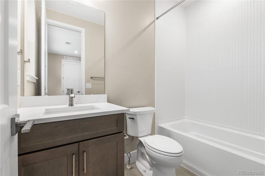 Furnished interior view inside a new home in Autograph at Lyric, Lone Tree (Image 33).