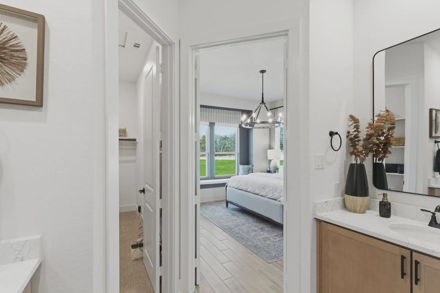 Representative furnished interior of a home built from the Pegasus by Chesmar Homes in Centero at Stone Oak, San Antonio (Image 10).