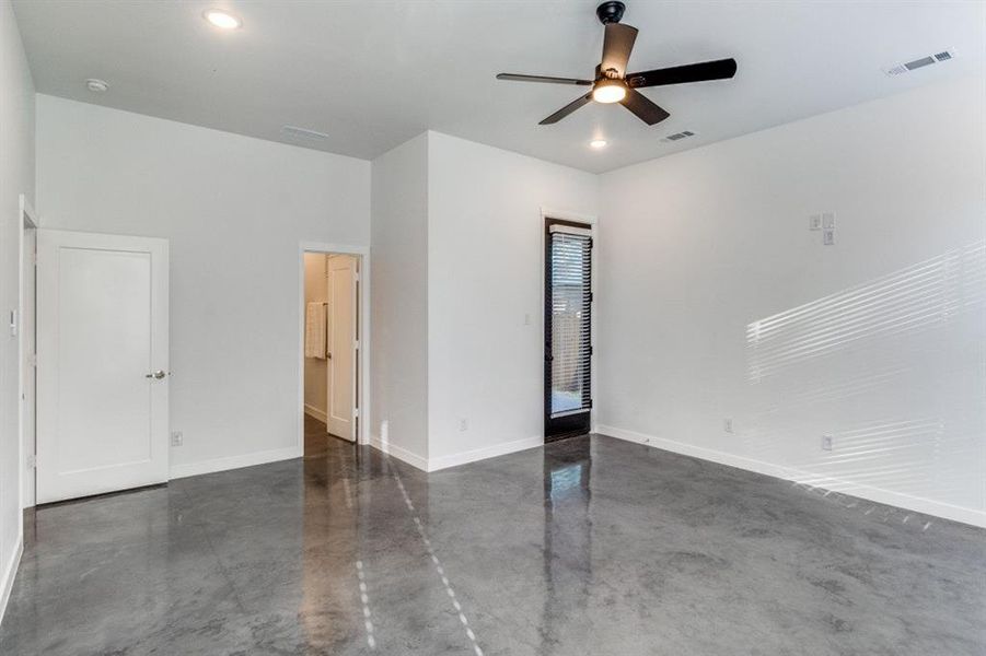 Spare room with ceiling fan