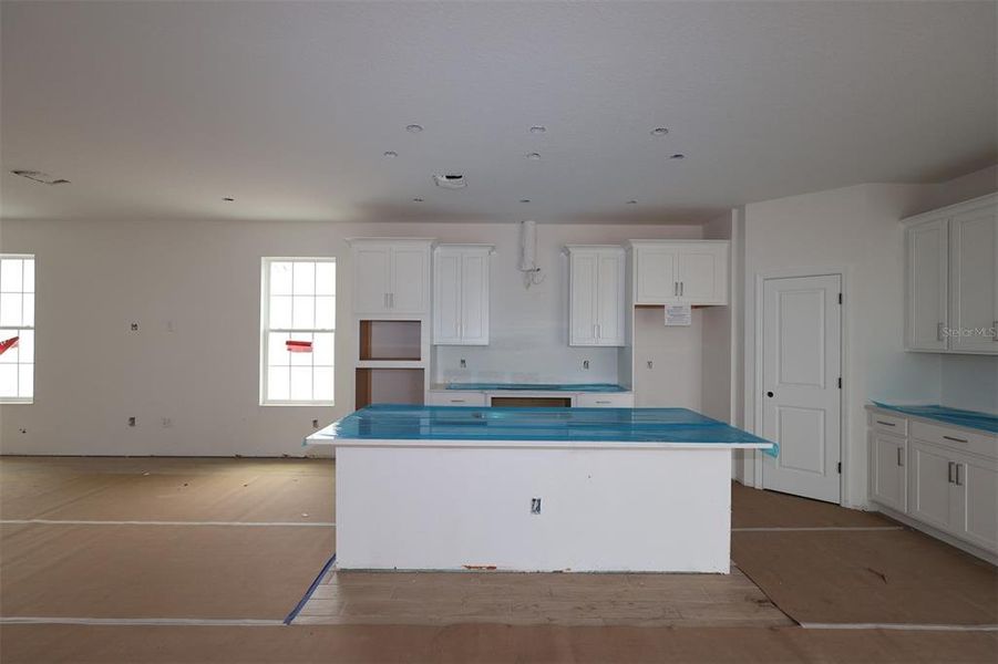 In-progress construction of a new home in Center Lake on the Park, St. Cloud, FL (Image 18).