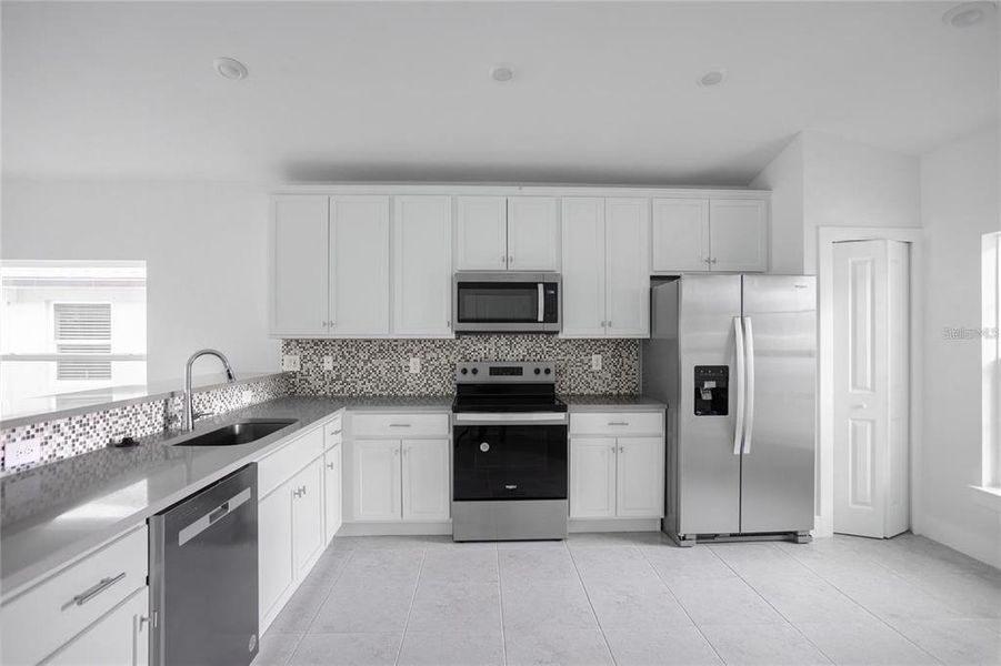 Furnished interior view inside a new home in , Port Charlotte (Image 8).