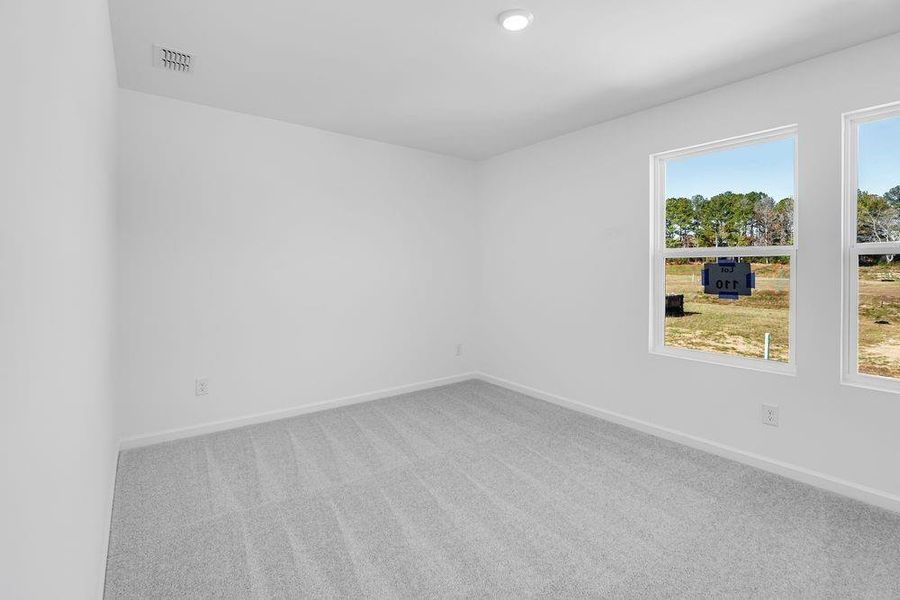 Spacious, unfurnished interior of a new home in Windance Lake, Loganville (Image 25).
