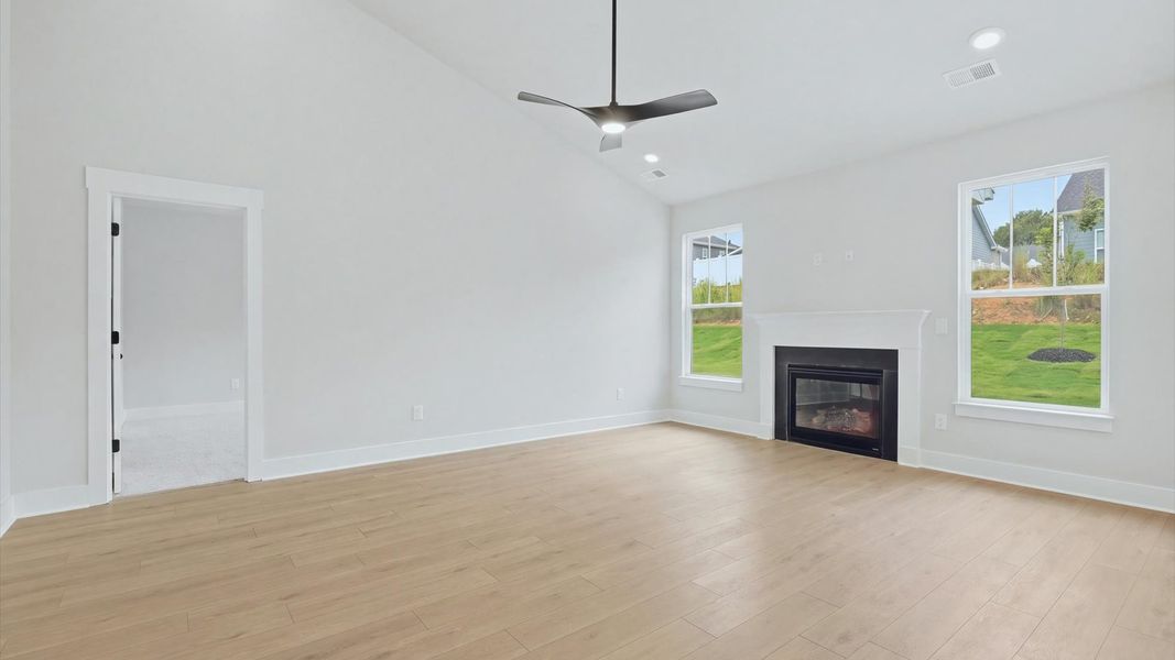 Spacious and stylish family room with two-story ceilings that create a bright and open atmosphere in Anderson, SC