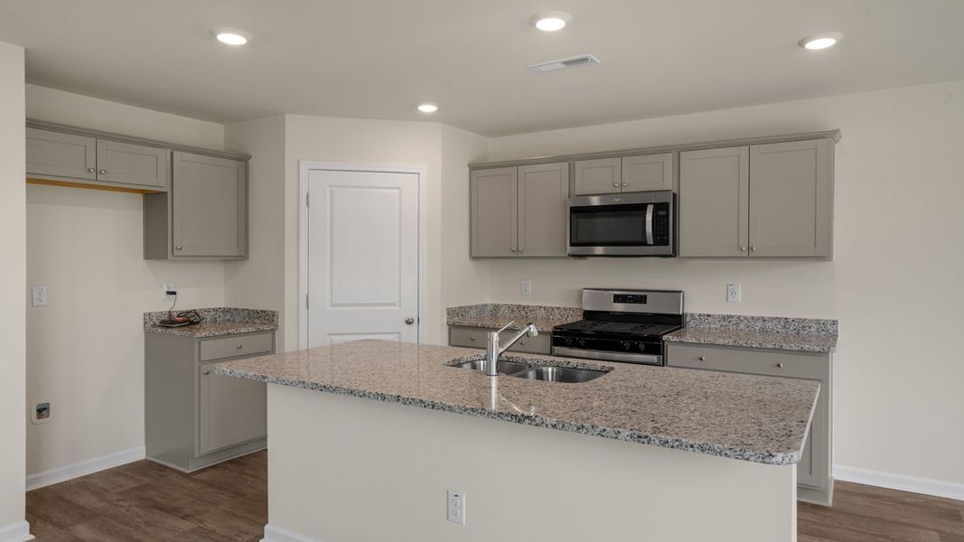 Furnished interior view inside a new home in Willow Mill, Thomasville (Image 9). Furnished interior view inside a new home in Willow Mill, Thomasville (Image 9).