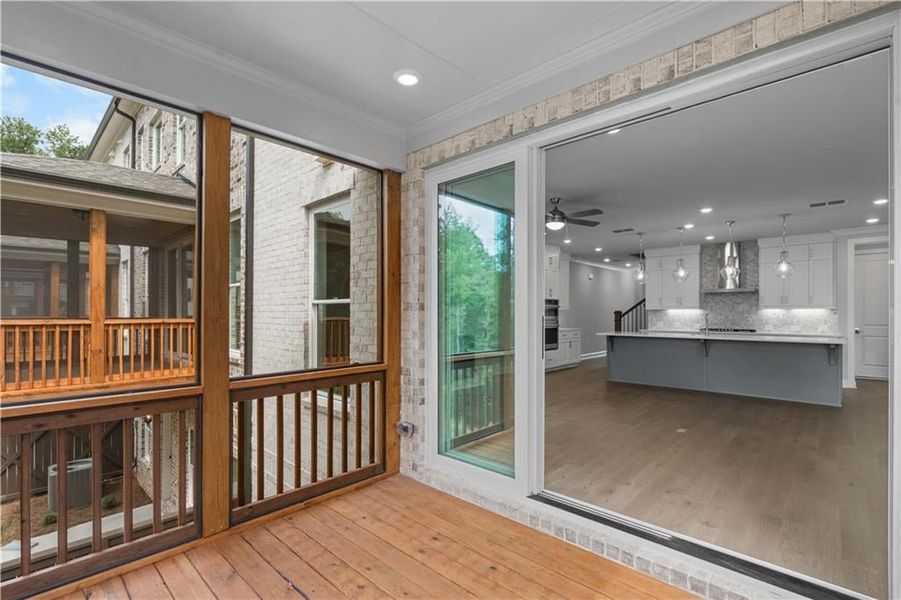 Entryway with hardwood / wood-style flooring, crown molding, recessed lighting, stairway, and a ceiling fan Entryway with hardwood / wood-style flooring, crown molding, recessed lighting, stairway, and a ceiling fan