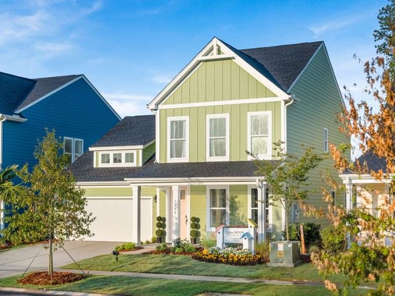 Representative exterior photo of a completed home built from the Devin P by True Homes in Homecoming, Ravenel, SC (Image 2). Representative exterior photo of a completed home built from the Devin P by True Homes in Homecoming, Ravenel, SC (Image 2).