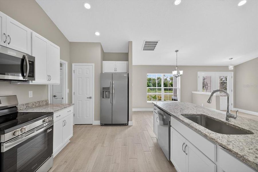Furnished interior view inside a new home in , Spring Hill (Image 10).