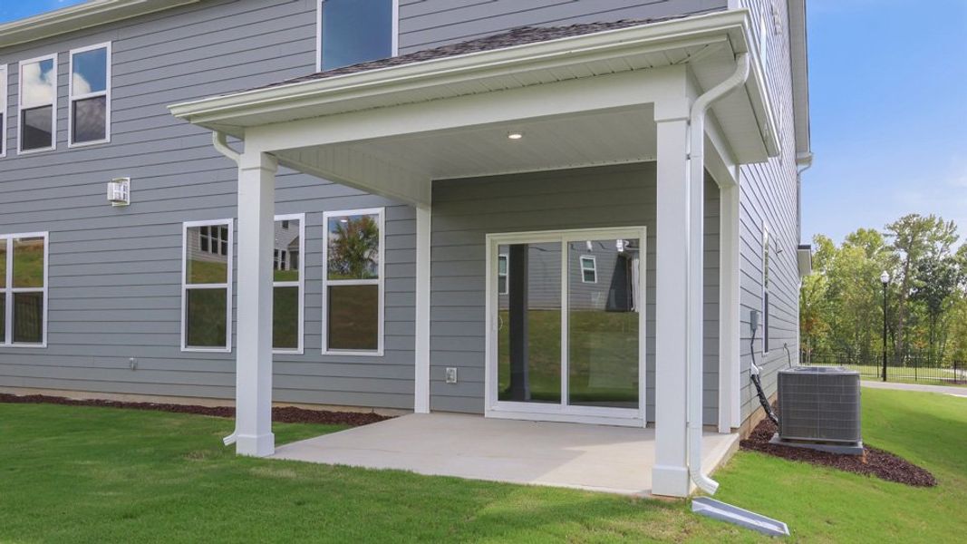 Exterior details and patio area of a home in The Grove at Winston Pointe, Clayton (Image 4).