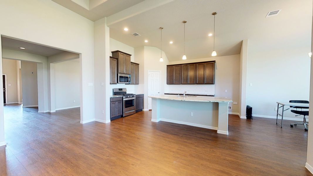 Representative furnished interior of a home built from the Floor Plan 3256 by Colina Homes in Grand Magnolia, Magnolia (Image 12).