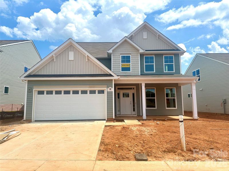 Homesite 164 features a Cypress C floorplan with front-load garage.