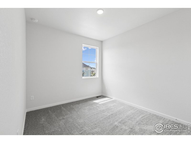 Spacious, unfurnished interior of a new home in Kinston Cottage, Loveland (Image 37).