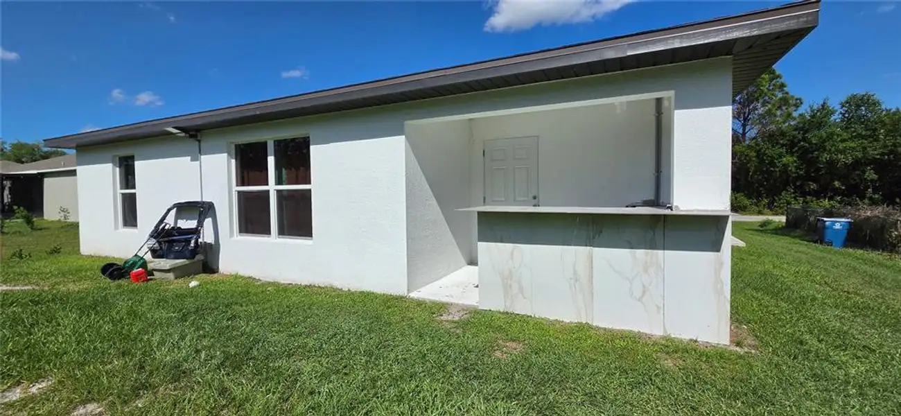 Exterior details and patio area of a home in , Palm Bay (Image 4).