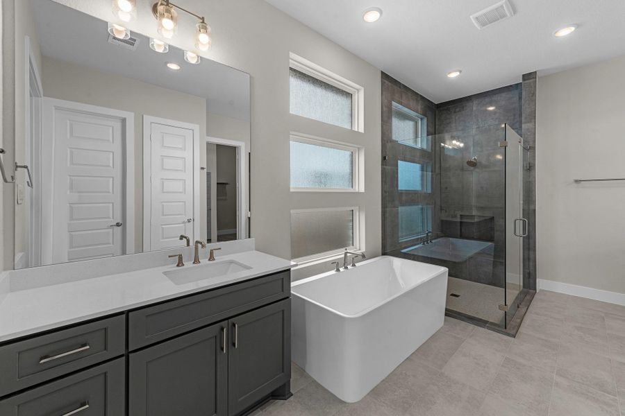 Furnished interior view inside a new home in Bridgeland, Cypress (Image 28).