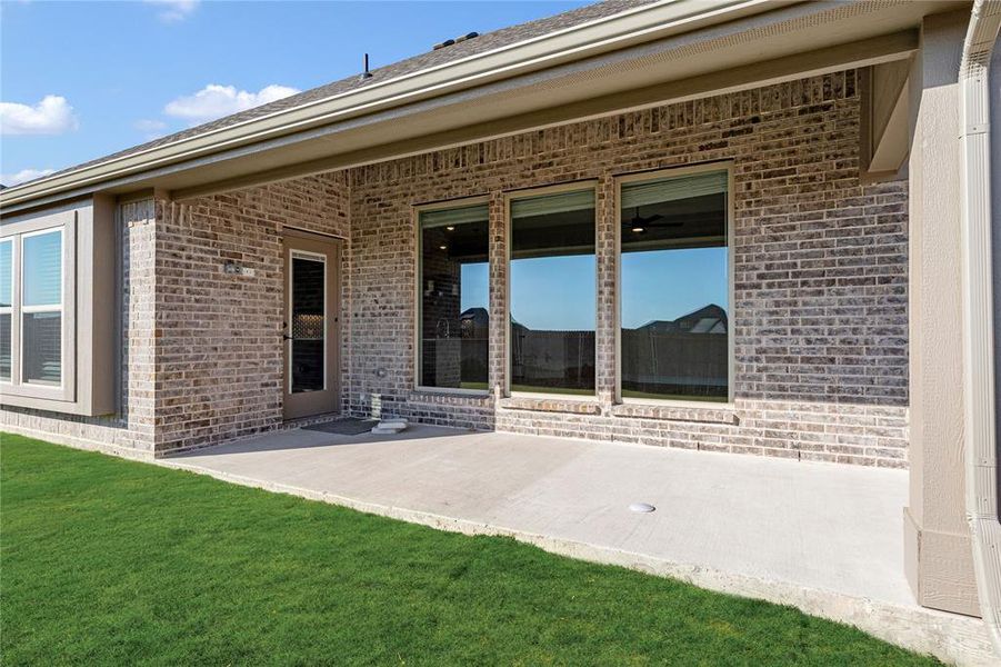 Exterior details and patio area of a home in Villages of Walnut Grove, Midlothian (Image 23).
